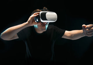 Review VR headsets like the Oculus Rift, HTC Vive, and PlayStation